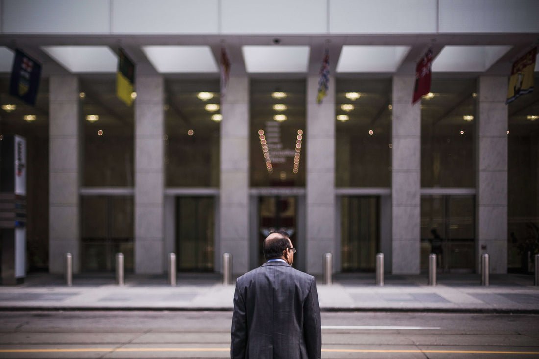 Business broker walking into head office