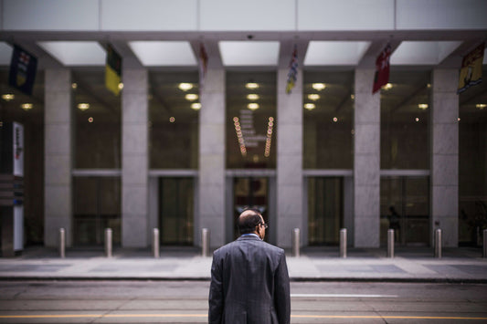 Business broker walking into head office