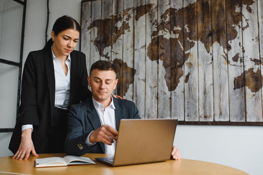 Business team collaborating to optimize global business listings online