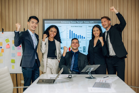 Diverse business team collaborating on sales strategy for profitable businesses