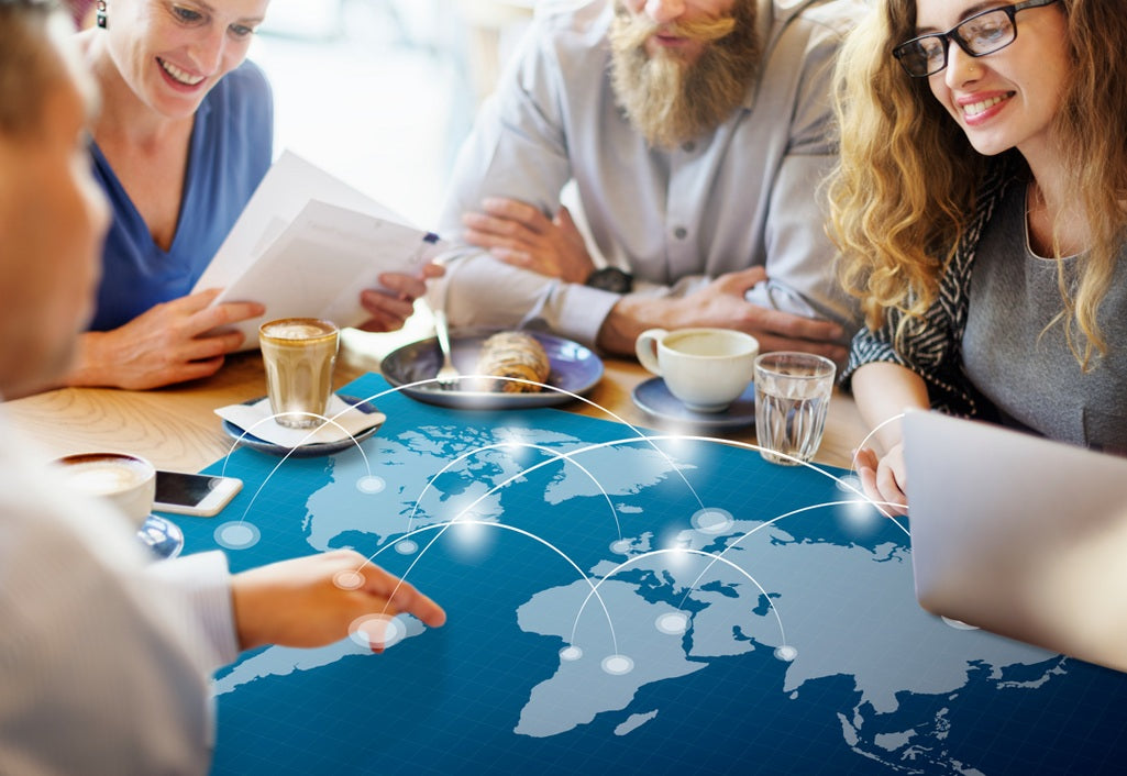 Group of professionals discussing global business opportunities