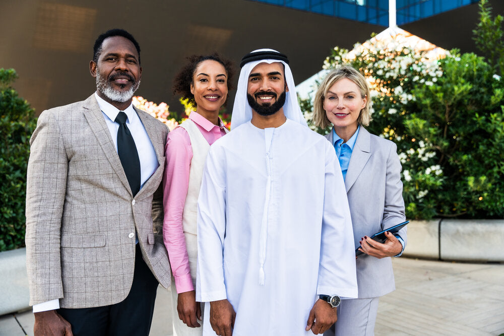 Group of multiethnic business people meeting to discuss the best places to buy a business worldwide in 2025