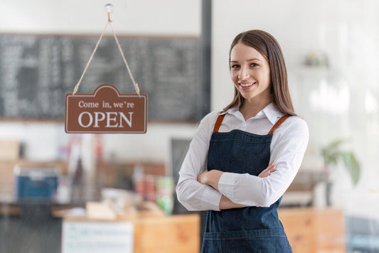 Confident small business owner standing in beauty salon, representing successful startup — ideal example of businesses for sale by owner in 2025.