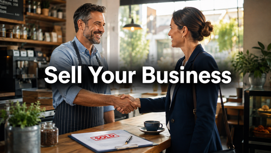 Business owner shaking hands with a buyer after successfully selling a café